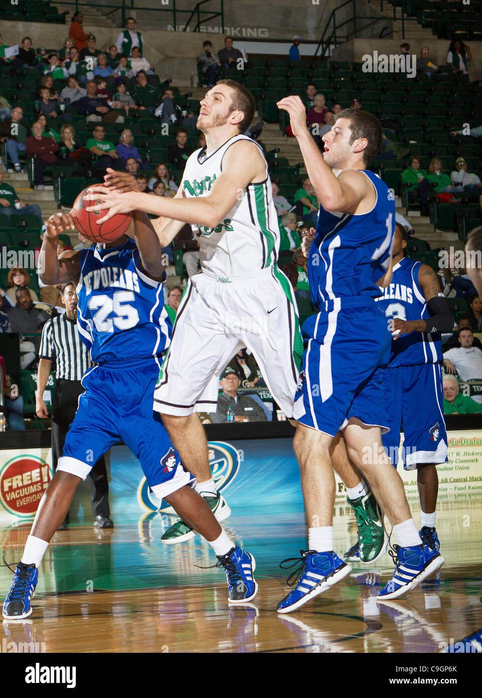 Dec. 27, 2011 - Denton, Texas, United States of America - North Texas Mean Green forward Niko Stojiljkovic (25) in action during the game between the New Orleans Privateers and the University of North Texas Mean Green at the North Texas Coliseum,the Super Pit, in Denton, Texas. UNT defeated UNO 78 t Stock Photo