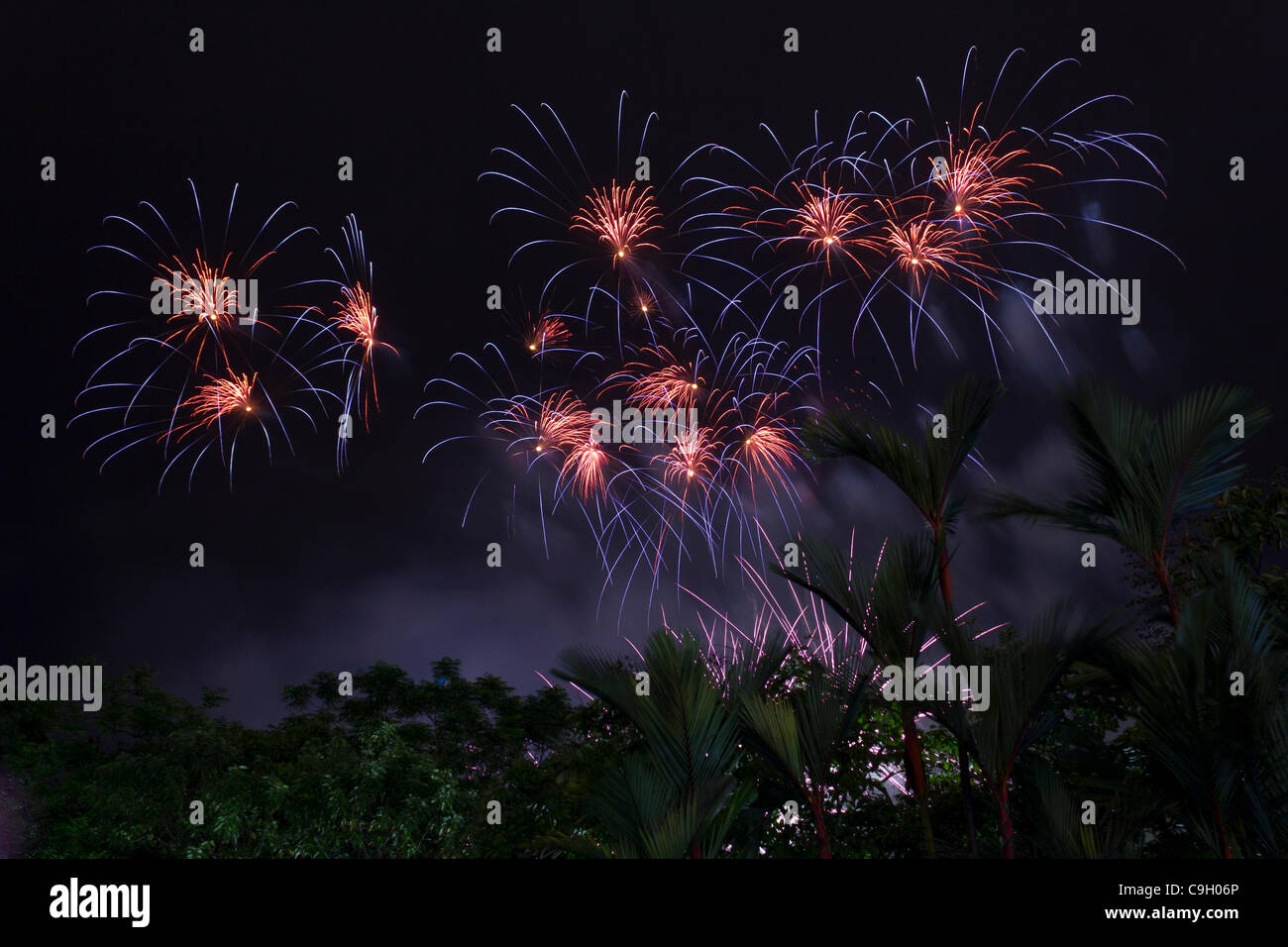 fireworks display beside the Petronas Towers, Kuala Lumpur, Malaysia, at new year 2012 celebrations Stock Photo