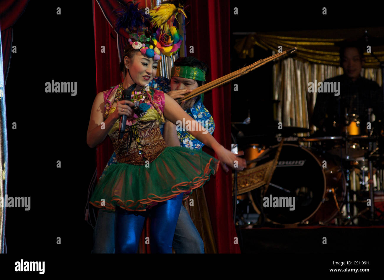 traditional dance from Issan (Thailand's North East) keeps new years eve alive at Tawandang German Microbrewery. Bangkok, Thailand , December 31st, 2011. Credit Line: Credit:  Kraig Lieb / Alamy Live News. Stock Photo