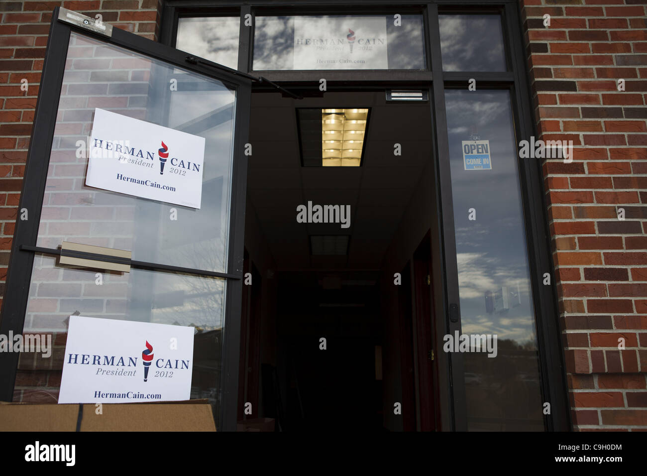 Dec. 31, 2011 - Urbandale, Iowa, U.S. - An ''Open, Come On In'' sign still hangs on the door as workers pack up boxes of signs and other materials from Republican Presidential candidate Herman Cain's campaign headquarters leading up to the Iowa Caucuses on Saturday, December 31, 2011 in Urbandale, I Stock Photo