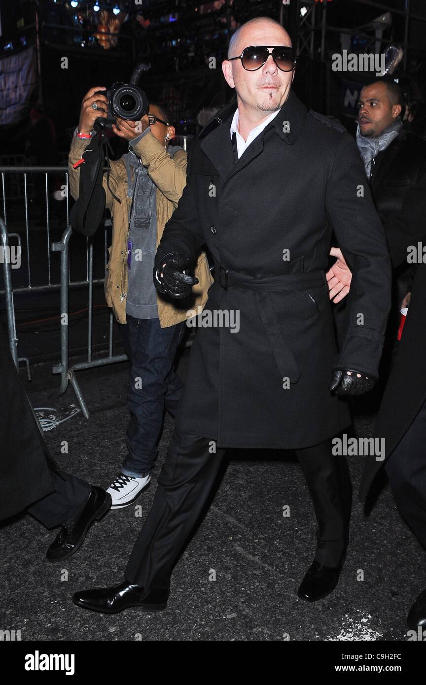Pitbull, leaves the Duffy Square performance stage at the New Year's