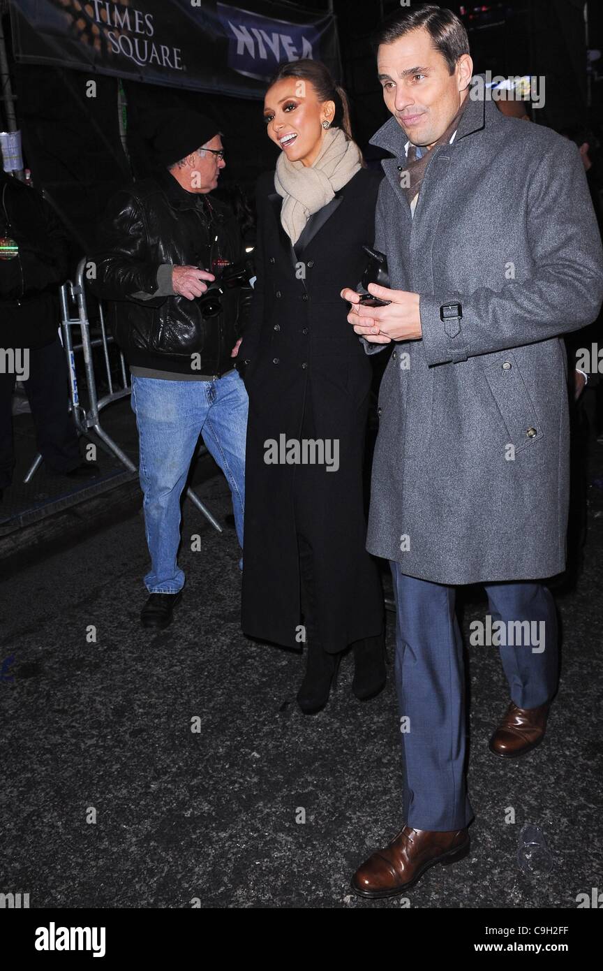 Giuliana Rancic, Bill Rancic, leave the Duffy Square performance stage ...