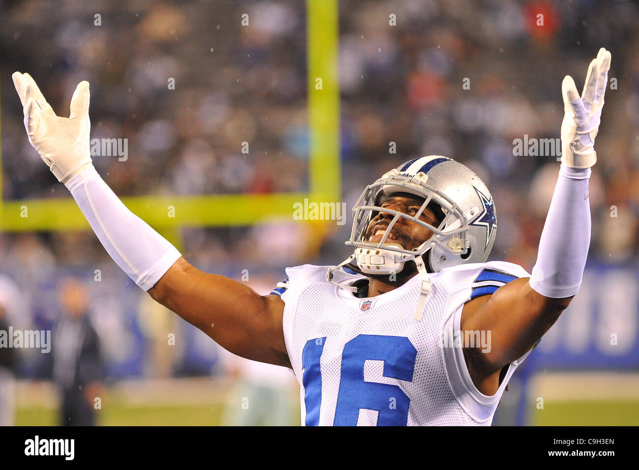 Oct. 25, 2010 - Arlington, Texas, United States of America - Dallas Cowboys  wide receiver Jesse Holley #16 pumps up the crowd prior to kicking off in  1st half action as the