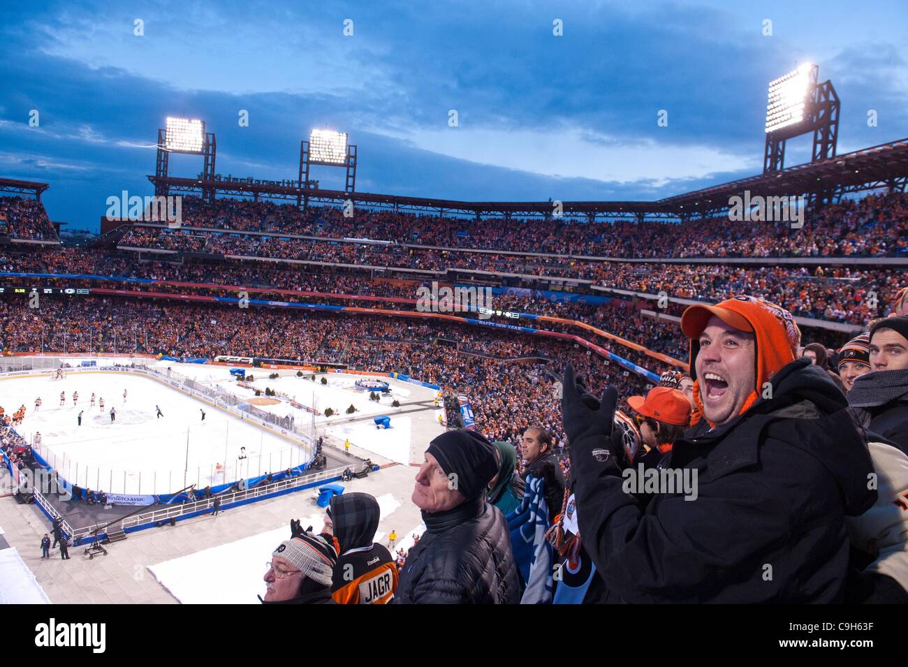 Jan. 02, 2012 - Philadelphia, Pennsylvania, U.S - Philadelphia Flyers fans celebrate the Flyers' second goal of the game during second period NHL Winter Classic action between the New York Rangers and Philadelphia Flyers at Citizens Bank Park. The Rangers defeated the Flyers 3-2. (Credit Image: © Wi Stock Photo