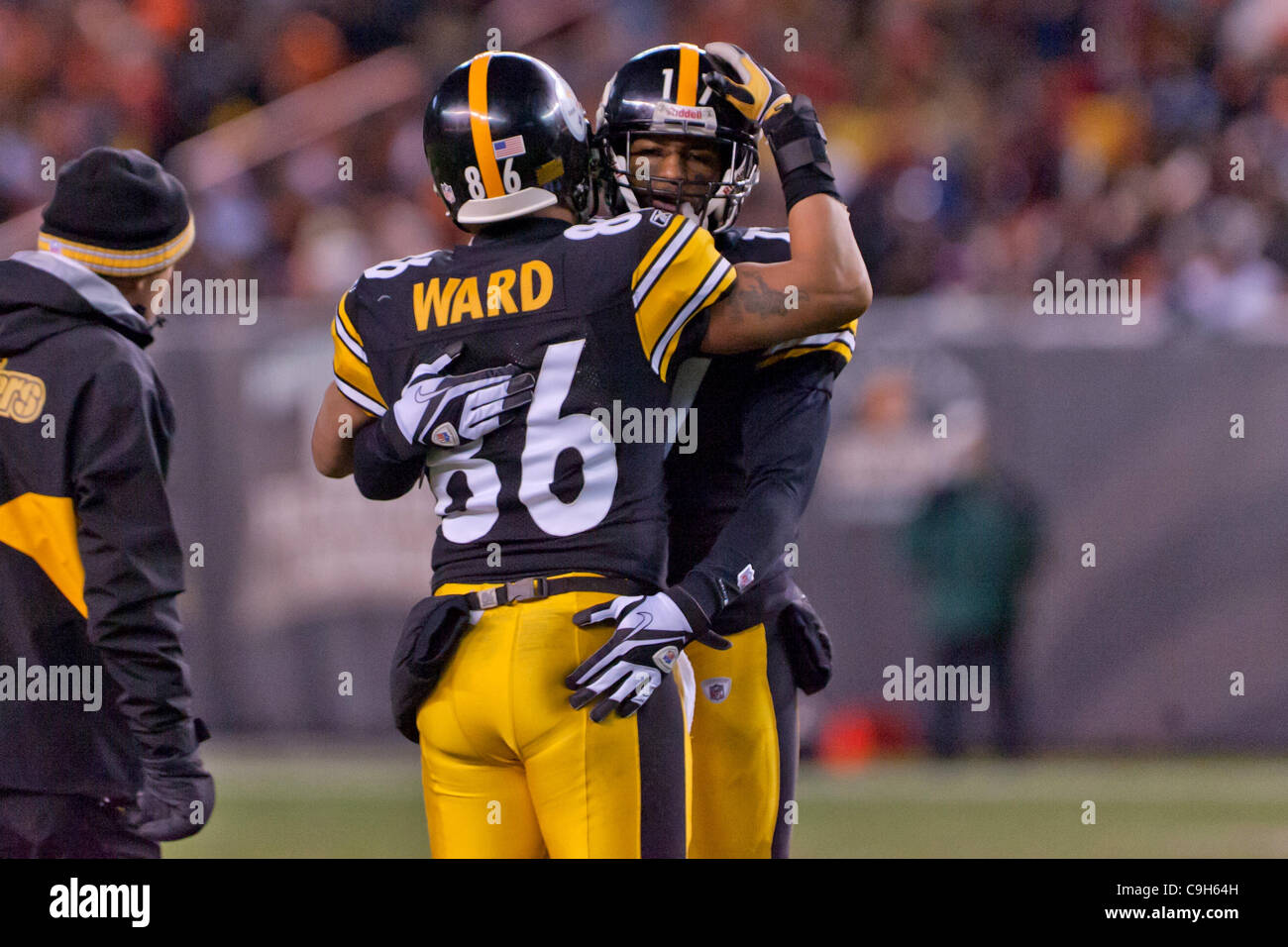 Jan. 1, 2012 - Cleveland, Ohio, U.S - Pittsburgh wide receivers Hines Ward (86) and Mike Wallace (17) embrace in celebration of Ward's 1,000th pass reception during the fourth quarter against Cleveland.  The Pittsburgh Steelers defeated the Cleveland Browns 13-9 in the game played at Cleveland Brown Stock Photo