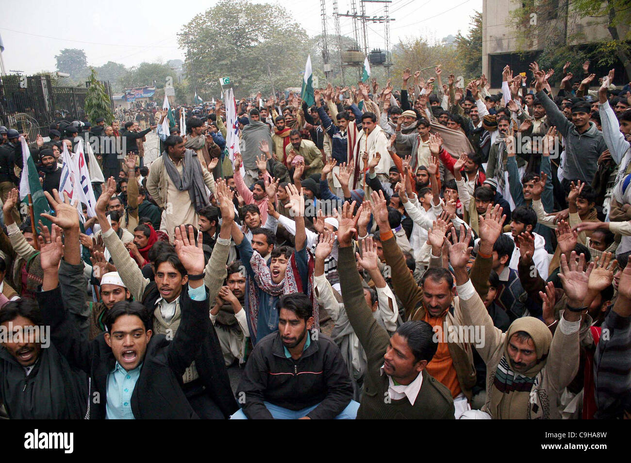 Textile industry workers shout slogans against gasloadshedding during