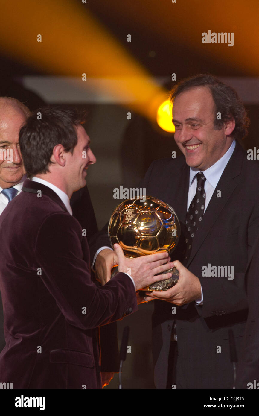 L-R) Lionel Messi, Michel Platini, JANUARY 9, 2012 - Football / Soccer :  Lionel Messi, FIFA World Player of the Year with the FIFA Ballon d'Or  trophy during the FIFA Ballon d'Or