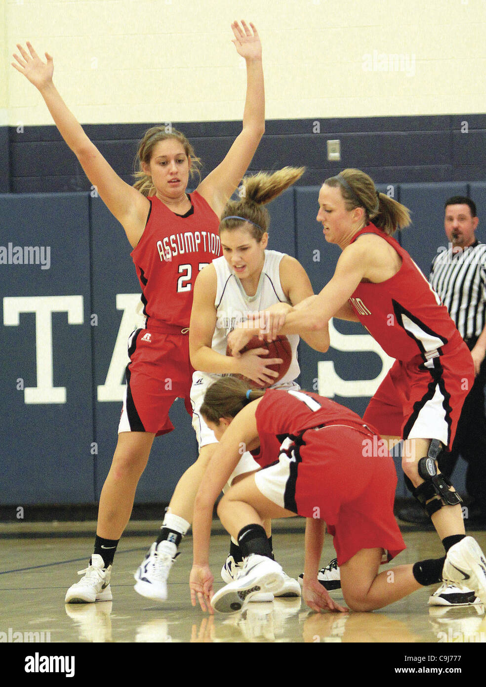 Jan. 6, 2012 - Bettendorf, Iowa, U.S. - Pleasant Valley's Katelyn Tuttle gets trapped by Assumption's Kate Herrig (23), Grace Fennelly (11) and Motgan Pavlich (15), Friday, January 6, 2012, during first half action. (Credit Image: © John Schultz/Quad-City Times/ZUMAPRESS.com) Stock Photo