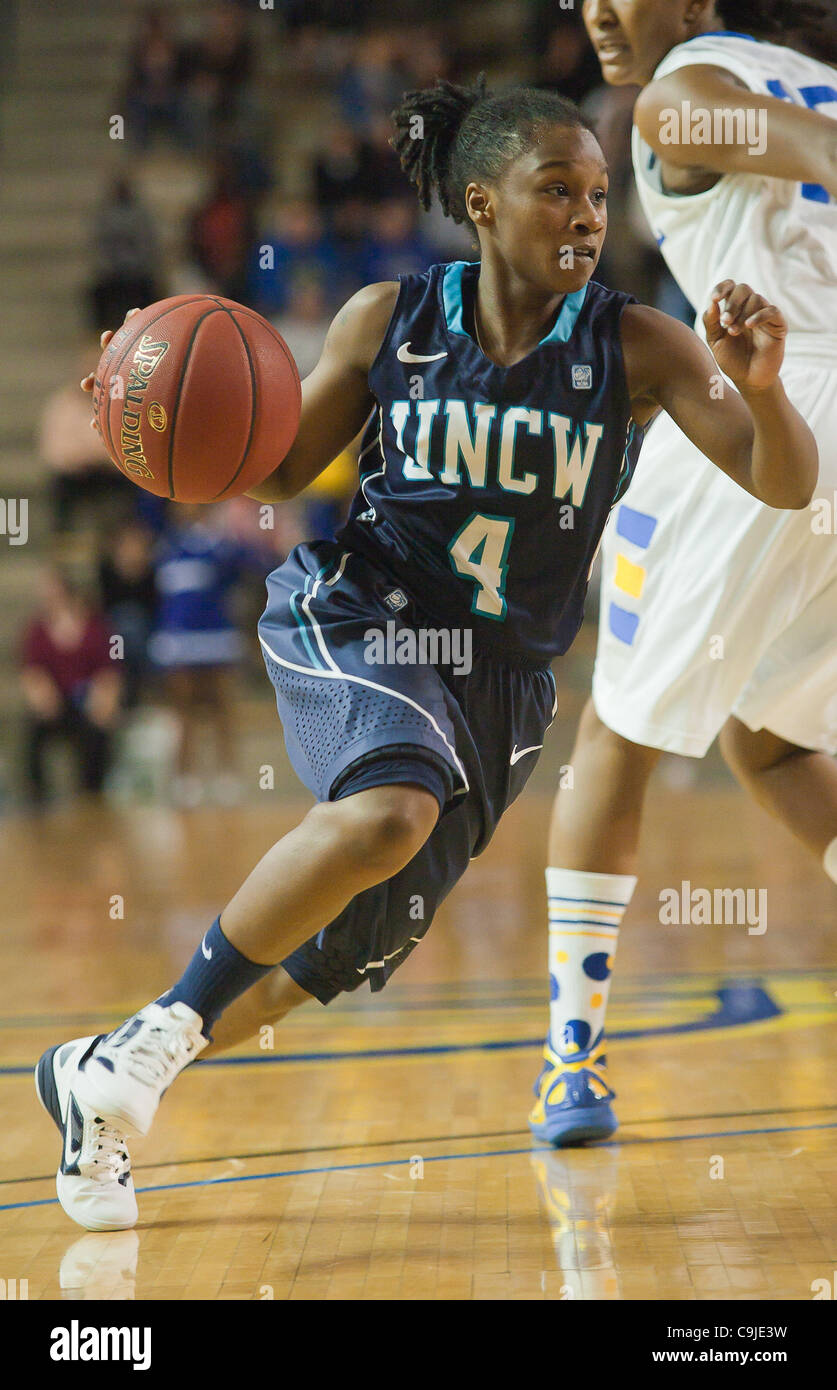 Jan. 12, 2012 - Newark, Delaware, United States of America - 01/12/12 Newark DE: University of North Carolina Wilmington Sophomore Guard Alisha Andrews #4 drives past Delaware Forward #12 Danielle Parker during a Colonial Athletic Association Conference Basketball Game against The Fightin Blue Hens  Stock Photo