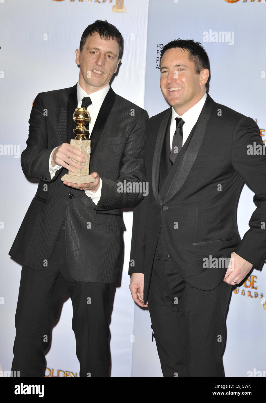 Jan. 16, 2011 - Beverly Hills, California, U.S. - Jan. 16, 2011 - Beverly Hills, California.USA  -   ATTICUS ROSS, TRENT REZNOR.poses in the pressroom at  THE 68th Golden Globe Awards. (Credit Image: © MFL/ZUMAPRESS.com) Stock Photo