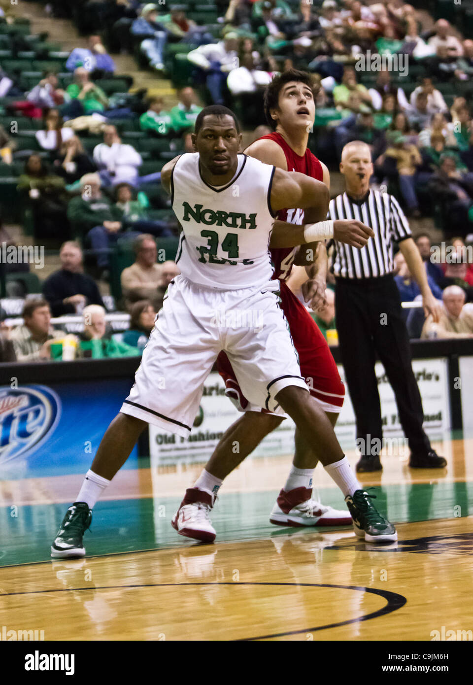 Jan. 12, 2012 - Denton, Texas, United States of America - North Texas Mean Green forward Alonzo Edwards (34) in action during the game between the Western Kentucky Hilltoppers and the University of North Texas Mean Green at the North Texas Coliseum,the Super Pit, in Denton, Texas. UNT defeated Weste Stock Photo