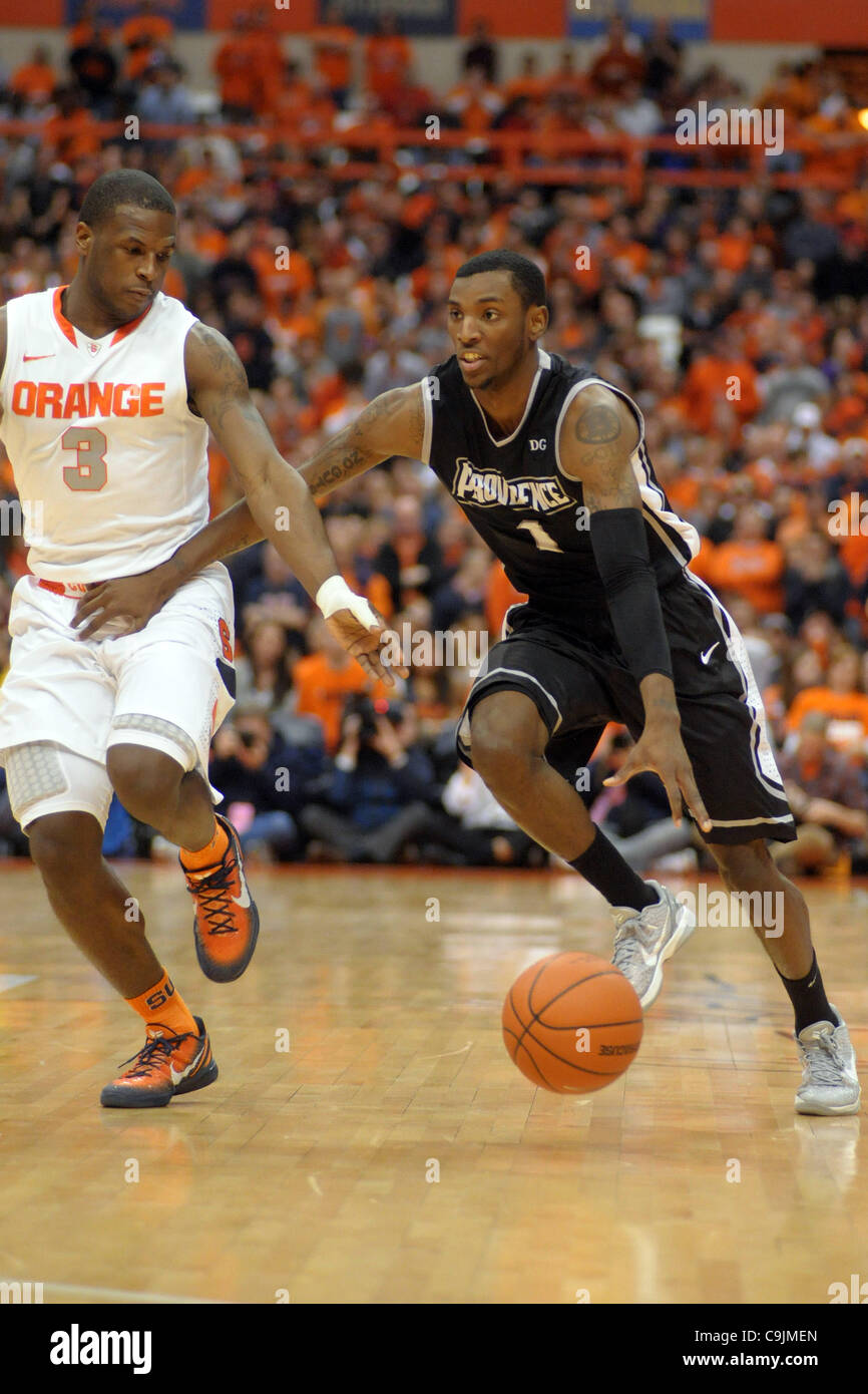 Jan. 14, 2012 - Syracuse, New York, U.S - Providence Friars guard Gerard Coleman (1) drives up court against Syracuse Orange guard Dion Waiters (3) in the first half at the Carrier Dome in Syracuse, NY.  The top ranked Syracuse Orange lead the Providence Friars 38-21 at the half. (Credit Image: © Mi Stock Photo