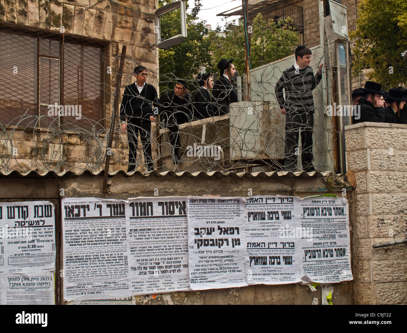 Hundreds of ultra-Orthodox Haredim riot in the neighborhood of Mea Shearim near Kikar Hashabbat protesting arrest of six community members this morning for alleged tax offenses worth millions. Jerusalem, Israel. 15th January 2012. Stock Photo