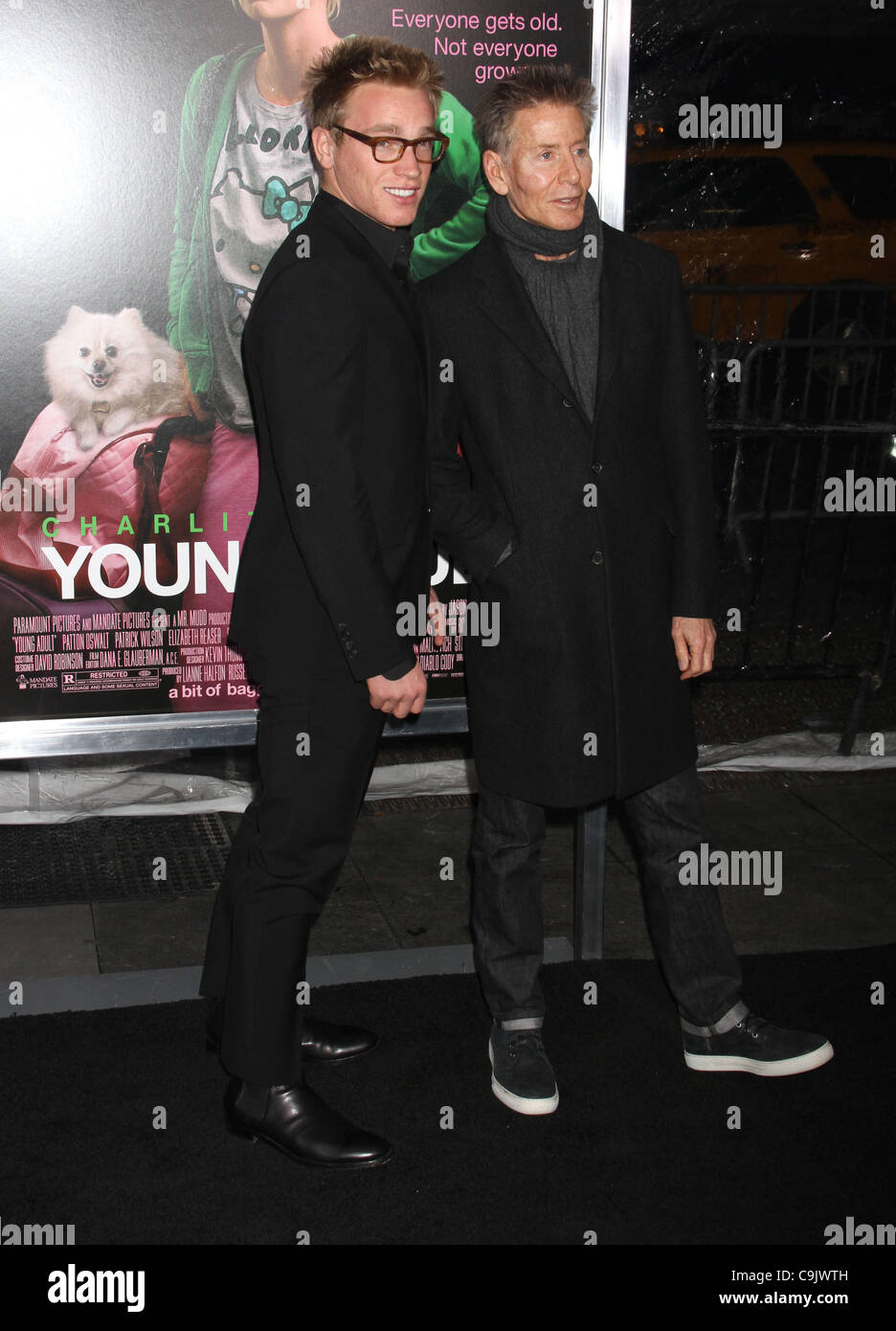 Dec. 8, 2011 - New York, NY,  - Calvin Klein with Nick Gruber at the ' Young Adult' World Premiere which took place at the Ziegfield. (Credit  Image: © Dan Herrick/ Stock Photo - Alamy