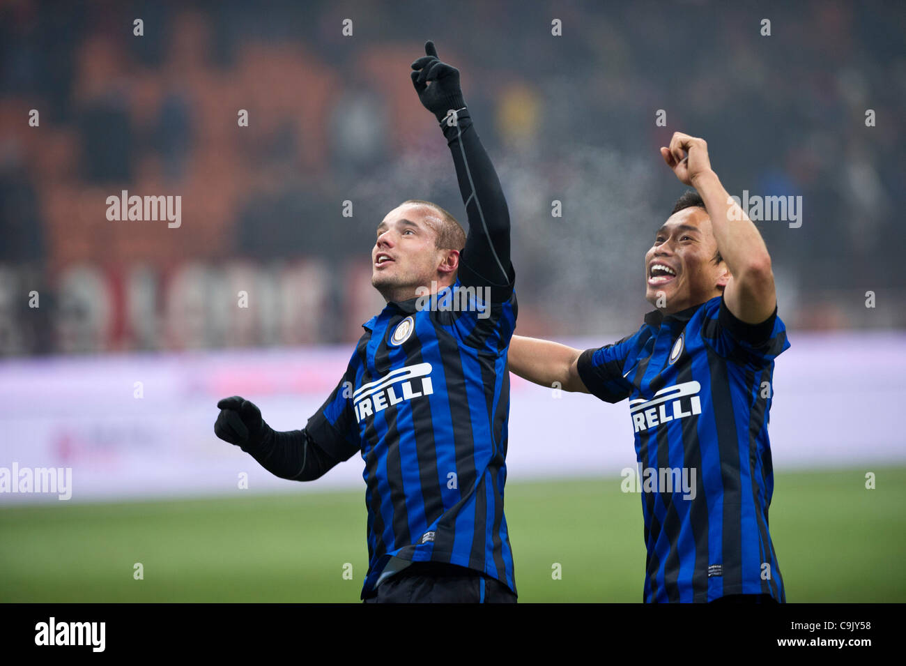 (L-R) Wesley Sneijder, Yuto Nagatomo (Inter), JANUARY 15, 2012 - Football / Soccer : Yuto Nagatomo of Inter celebrates after winning the Italian 'Serie A' match between AC Milan 0-1 Inter Milan at Stadio Giuseppe Meazza in Milan, Italy. (Photo by Maurizio Borsari/AFLO) [0855] Stock Photo