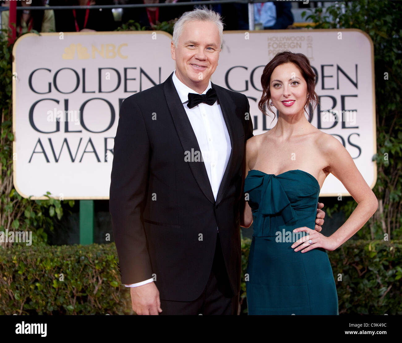 Tim Robbins, left, and Eva Amurri arrive to the 69th Annual Golden