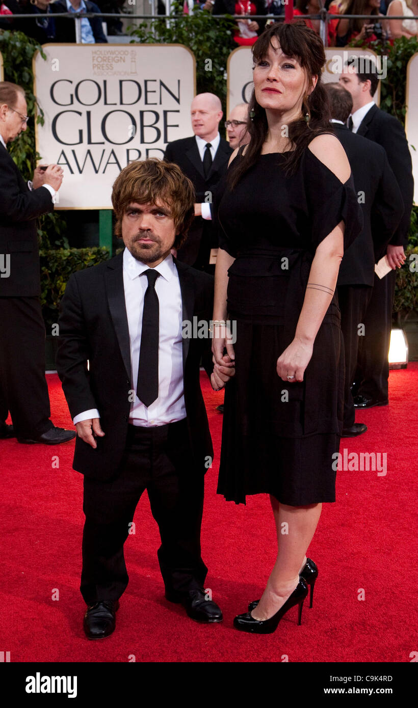 Peter Dinklage and Erica Schmidt arrive to the 69th Annual Golden Globe Awards at the Beverly Hilton Hotel in Beverly Hills, California on Sunday, January 15, 2012. Stock Photo