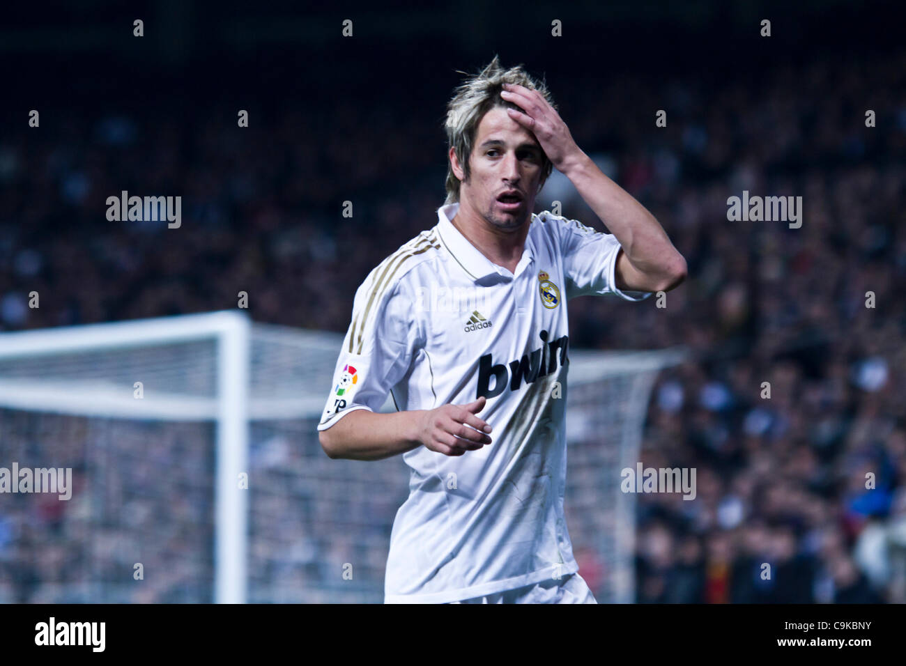 18/01/2011 - MADRID, Spain // COPA DEL REY FOOTBALL - Real Madrid vs. Barcelona - 1/4 finals - Santiago Bernabeu ------------- Fabio Coentrao from Real Madrid laments for a lost opportunity Stock Photo