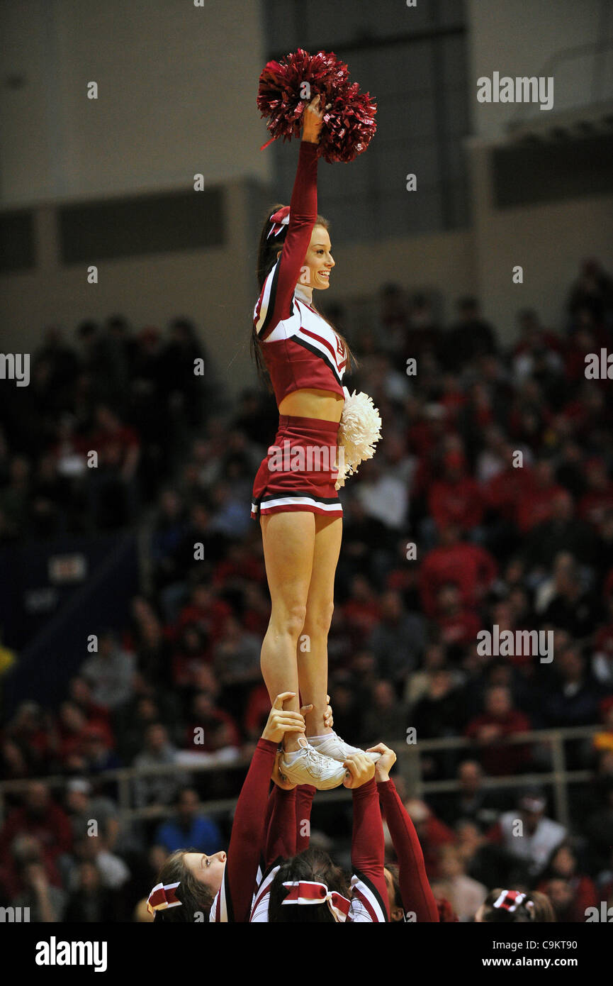 Jan. 21, 2012 - Philadelphia, Pennsylvania, U.S - A Temple cheerleader performs on the court during the  NCAA basketball game between the Temple Owls and the Maryland Terrapins at the Palestra in Philadelphia. Temple beat Maryland 73-60. (Credit Image: © Ken Inness/Southcreek/ZUMApress.com) Stock Photo