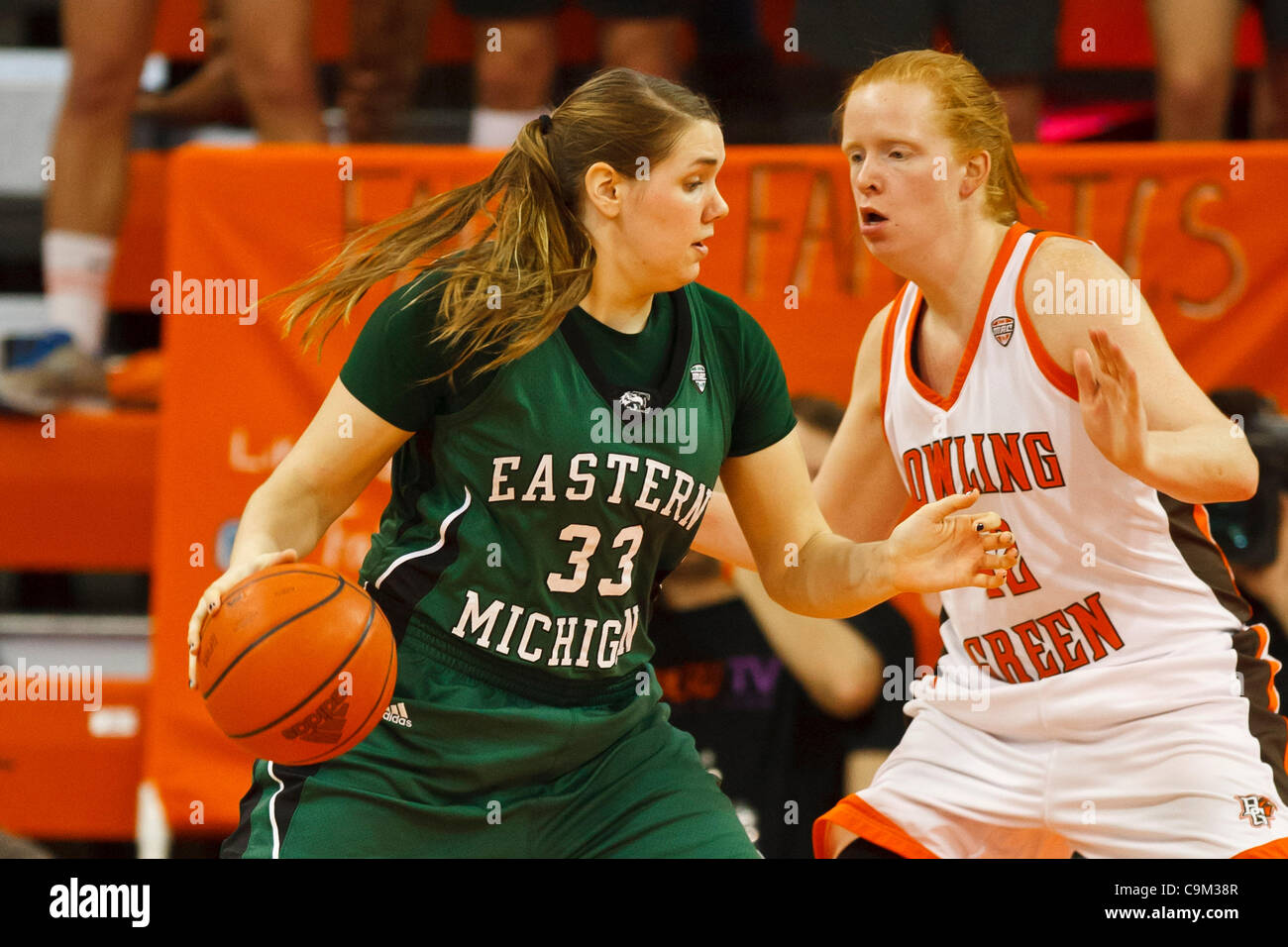 Jan. 22, 2012 - Bowling Green, Ohio, U.S - Eastern Michigan forward Olivia Fouty (33) tries to drive against Bowling Green forward Danielle Havel (42) during second-half game action.  The Bowling Green Falcons, of the Mid-American Conference East Division, defeated the Eastern Michigan Eagles, of th Stock Photo