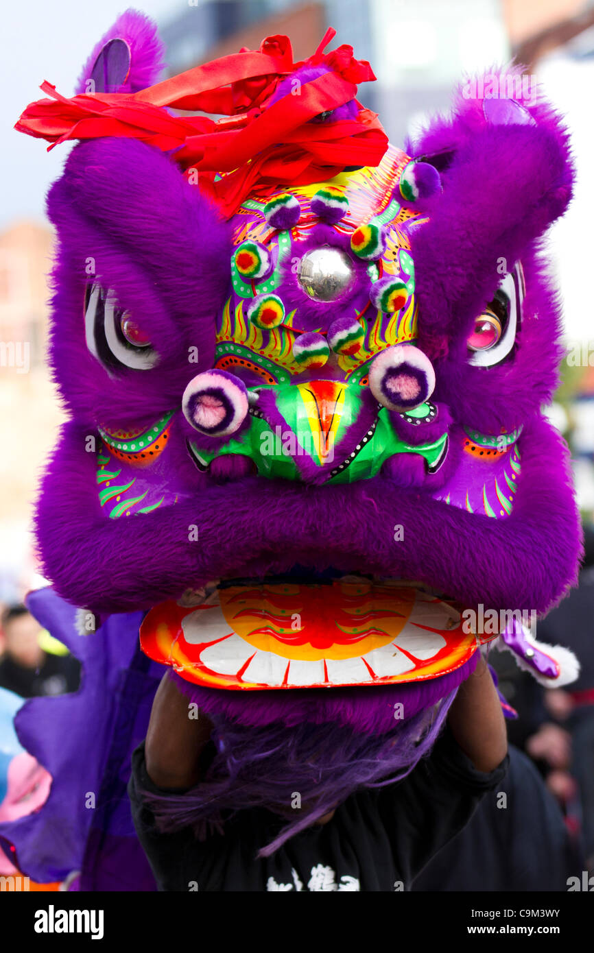 Purple Dragon Head People And Performers At The Chinese Year Of The Dragon Liverpool City Centre Parade Celebration And Festival 22nd January 2012 Chinatown Uk Stock Photo Alamy