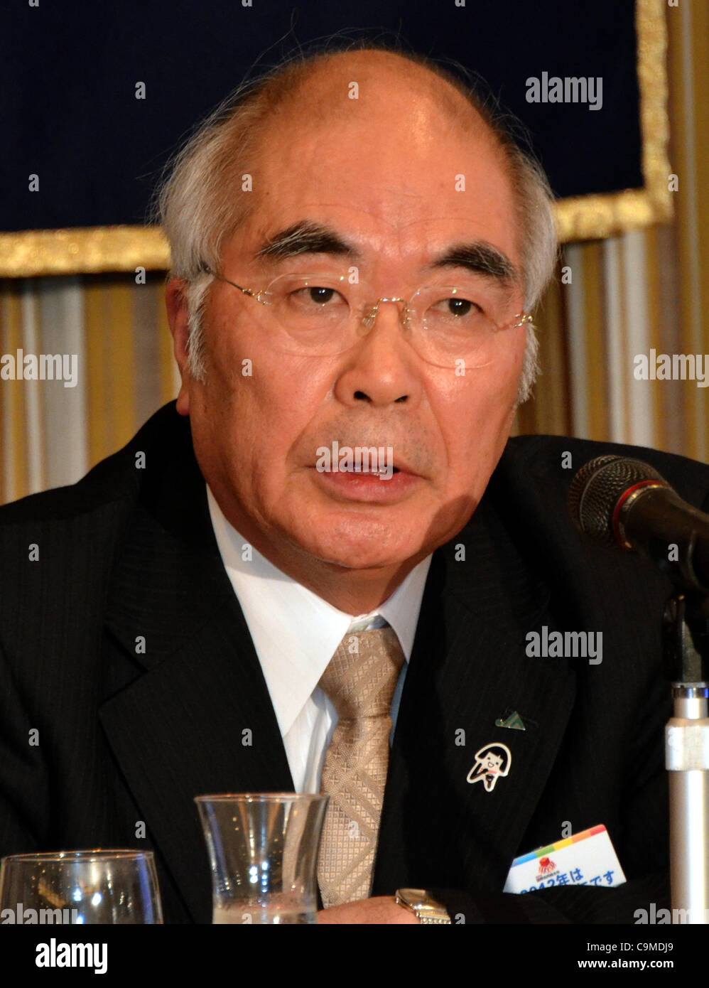 January 25, 2012, Tokyo, Japan - Akira Banzai, president of the Central Union of Agricultural Cooperative, voices his opinion against the Trans-Pacific Partnership free trade agreement during a news conference at Tokyo's Foreign Correspondents Club of Japan on Wednesday, January 25, 2012. While Japa Stock Photo