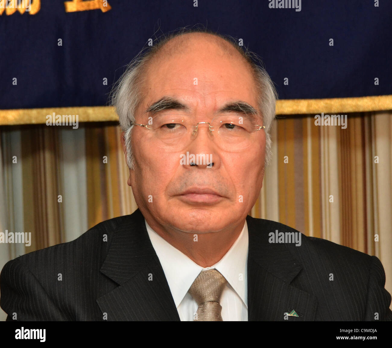 January 25, 2012, Tokyo, Japan - Akira Banzai, president of the Central Union of Agricultural Cooperative, voices his opinion against the Trans-Pacific Partnership free trade agreement during a news conference at Tokyo's Foreign Correspondents Club of Japan on Wednesday, January 25, 2012. While Japa Stock Photo