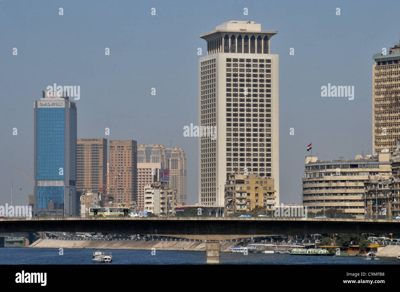 The skyline of central Cairo on the Nile River near Cairo's famous Tahrir (Liberation) Square on the first anniversary of the revolution that ousted former strongman President Hosni Mubarak. Stock Photo