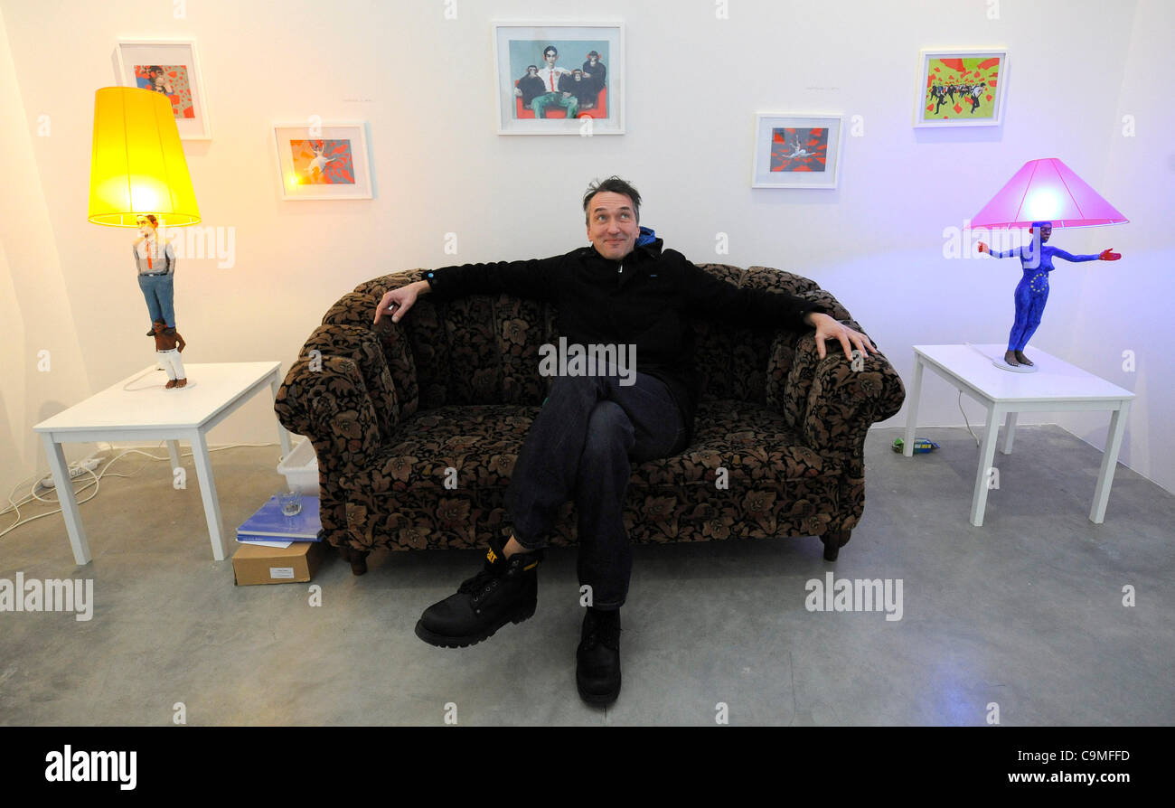 German artist Volker Marz is sitting in his artpiece exposed during the newly opened Middle East Europe exhibition in DOX art centre in Prague, Czech Republic. Pictured on January 25, 2012. (CTK Photo/Stan Zbynek) Stock Photo