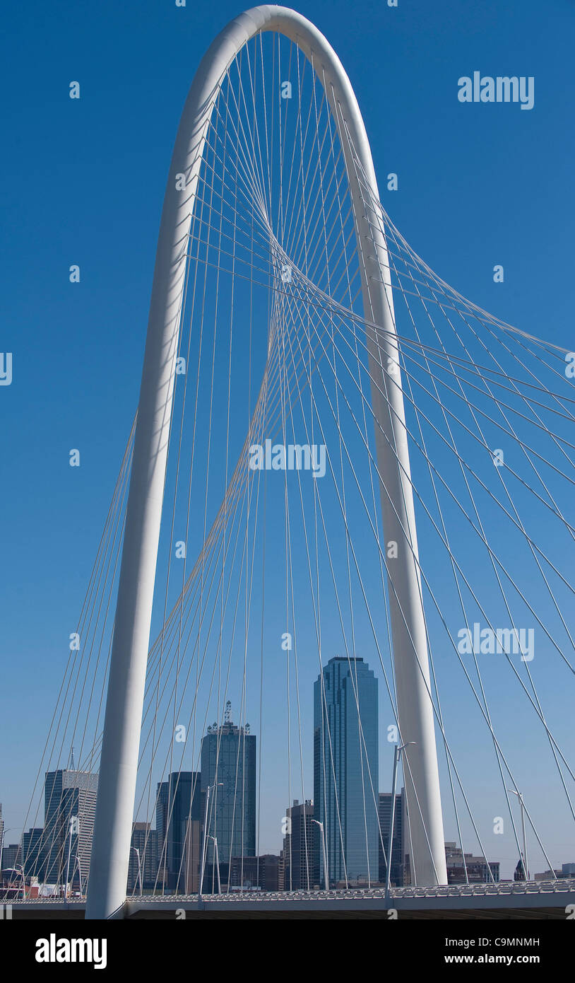 Jan. 26, 2012 - Dallas, Texas, USA - January 26, 2012. Dallas, Tx. USA. The  arch of the soon to be opened Margaret Hunt Hill Bridge frames the Dallas  skyline. The new