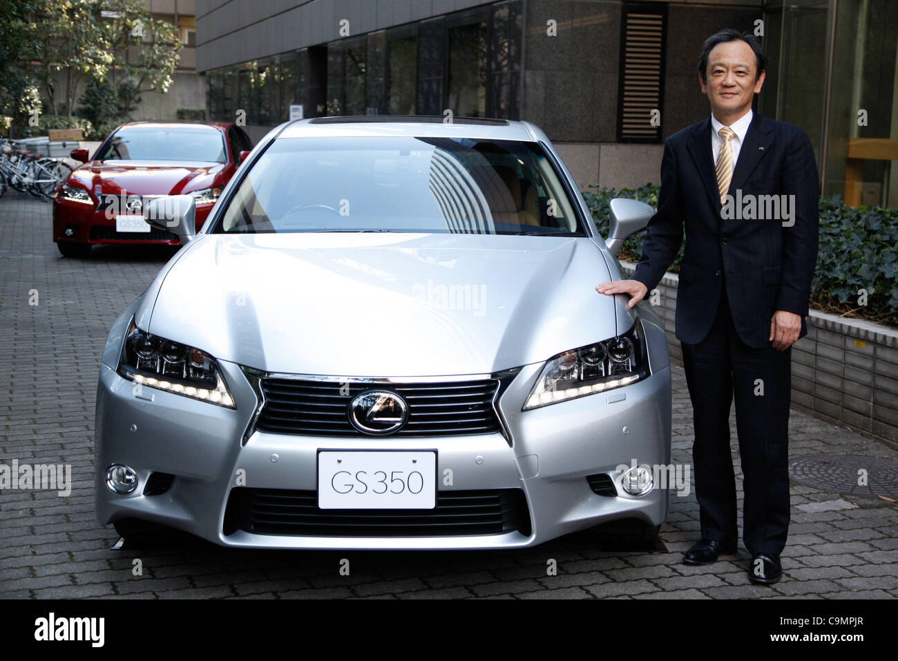 january-26-2012-tokyo-japan-kiyotaka-ise-general-manager-of-the-lexus-development-center-poses-with-the-next-generation-lexus-gs-350-midsize-sport-sedan-in-tokyo-on-thursday-january-26-2012