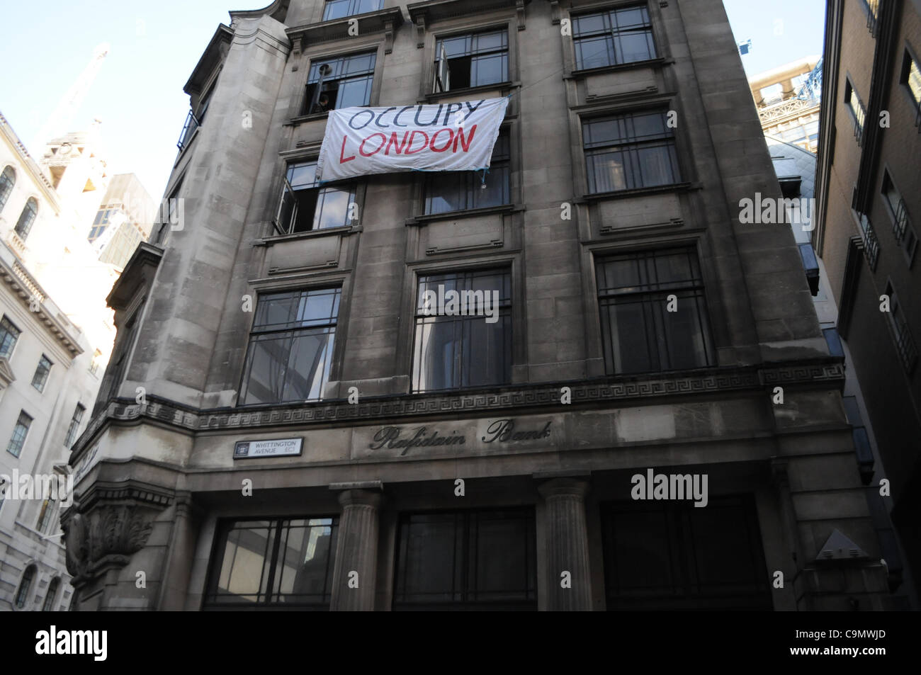 London Uk 27 01 12 Protesters Hang A An Occupy London Banner