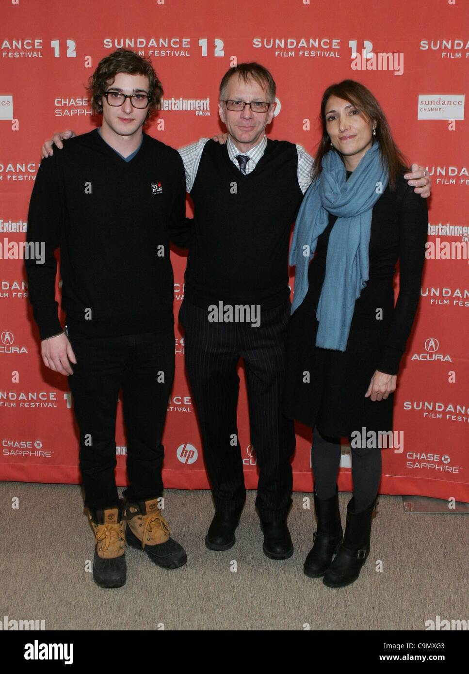 Phil Dorling (director), Ron Nyswaner (director), Neda Armian (producer) at arrivals for PREDISPOSED Premiere at the 2012 Sundance Film Festival, Eccles Theatre, Park City, UT January 27, 2012. Photo By: James Atoa/Everett Collection Stock Photo