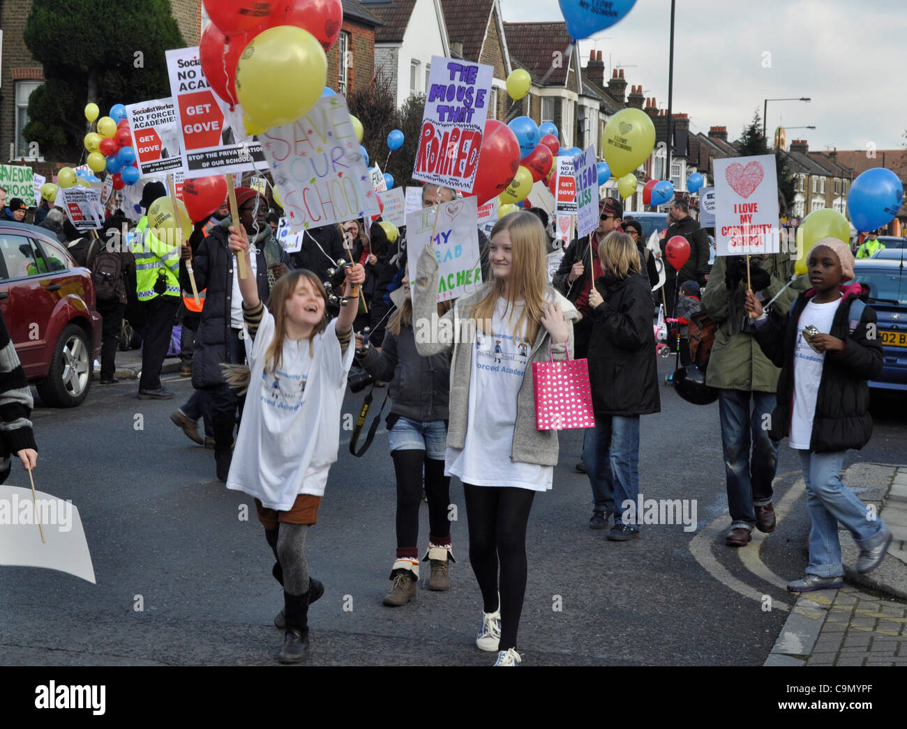28/01/2012 Haringey, London UK. Young students lead the way as parents and teachers protest against plans to turn Downhills primary school Tottenham into a sponsored academy. Stock Photo