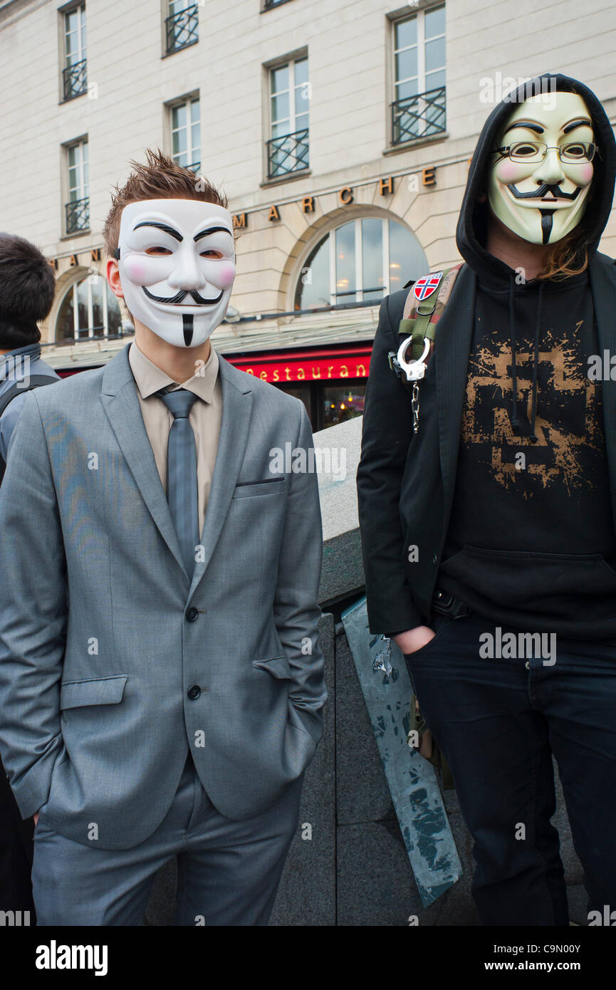Man anonymous mask standing against hi-res stock photography and images ...