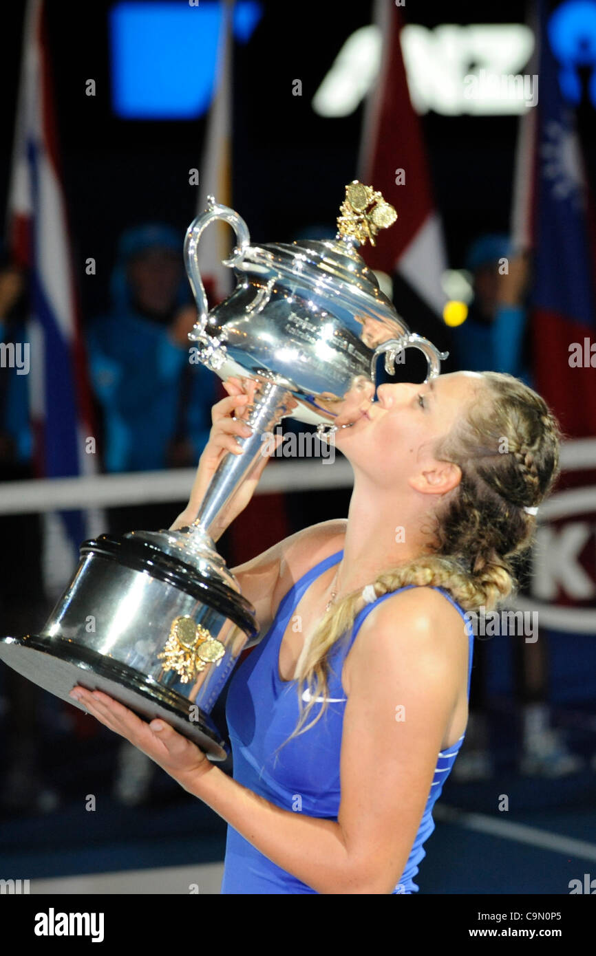 28.01.2012 Australian Open Tennis from Melbourne Park. Victoria. Womens Finals match.  Azarenka (BLR) kisses the trophy after winning the tournament on the thirteenth day of the Australian Open Tennis Championships in Melbourne, Australia. Victoria Azarenka beat Maria Sharapova 6-3 6-0 in the Austra Stock Photo