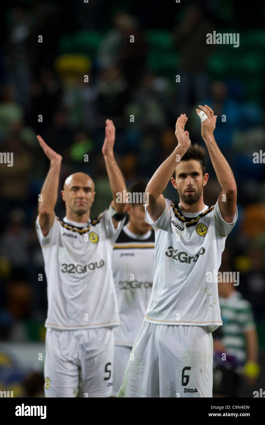 29 January 2012 - Lisbon, Portugal -   Beira Mar players (N. Coelho - R and Hugo - L) thanking the fans after loosing the game Sporting Lisbon vs SC Beira Mar game for the 17th round of the Portuguese Zon Sagres Football League, at Alvalade Stadium by 2-0.  Photo Credit: Pedro Nunes Stock Photo