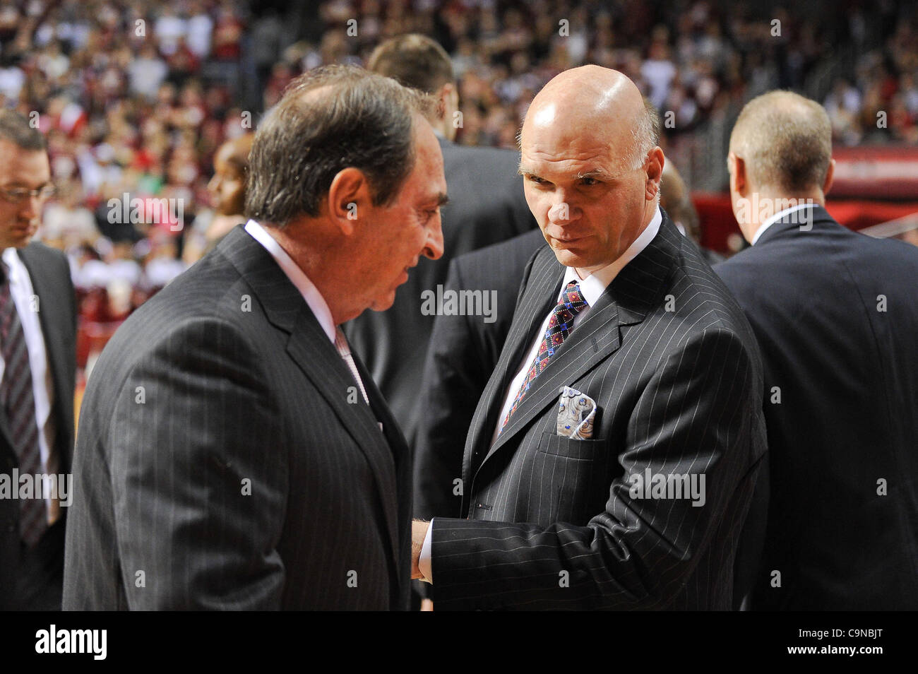 Jan. 28, 2012 - Philadelphia, Pennsylvania, U.S - Temple Owls head coach Fran Dunphy and Saint Joseph's Hawks head coach Phil Martelli prior to the start of the game. In a game being played at The Liacouras Center in Philadelphia, Pennsylvania. Temple leads Saint Joes at the half by a score of 38-24 Stock Photo