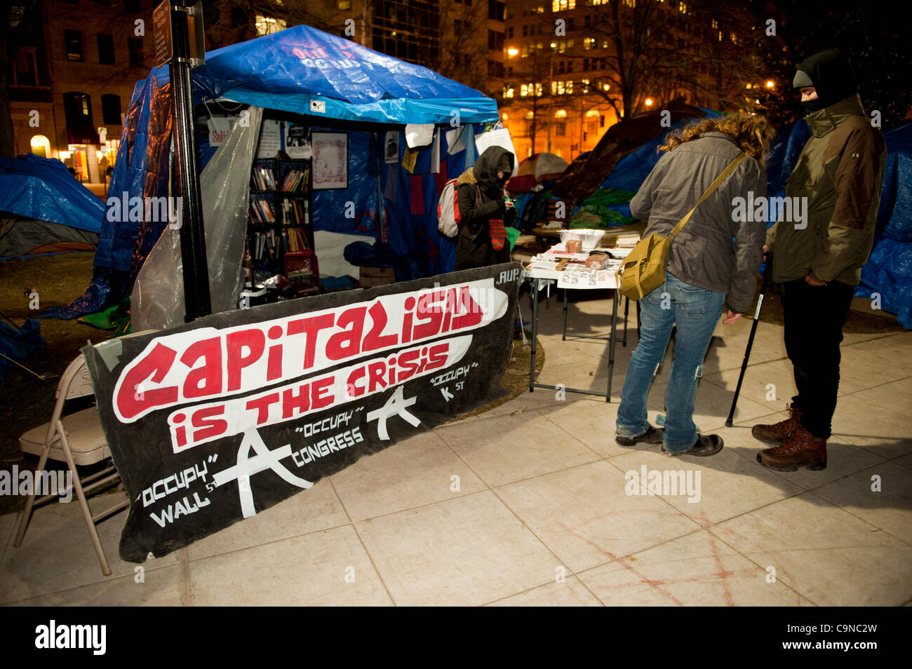 January 30, 2012, Occupy Washington DC, There are still plenty of tents and protesters on McPherson Square the night the city had told the Occupiers no more sleeping or camping in the park. Stock Photo