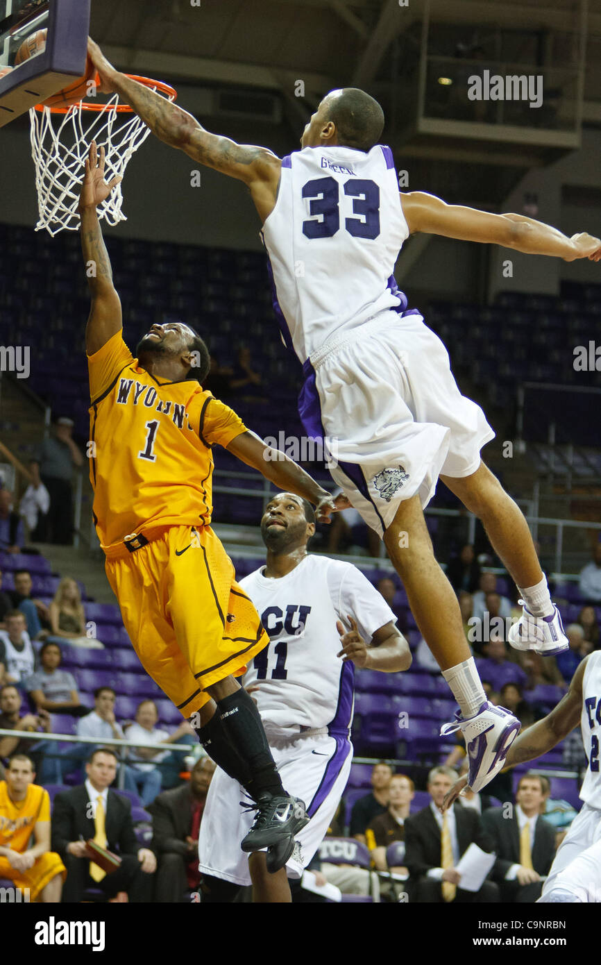 Feb. 1, 2012 - Fort Worth, Texas, US - Wyoming Cowboys Point Guard JayDee Luster (1) is rejected by TCU Horned Frogs Forward Garlon Green (33) during action between the Wyoming Cowboys and the TCU Horned Frogs.  TCU defeats Wyoming 58-52 at Daniel-Meyer Coliseum. (Credit Image: © Andrew Dieb/Southcr Stock Photo