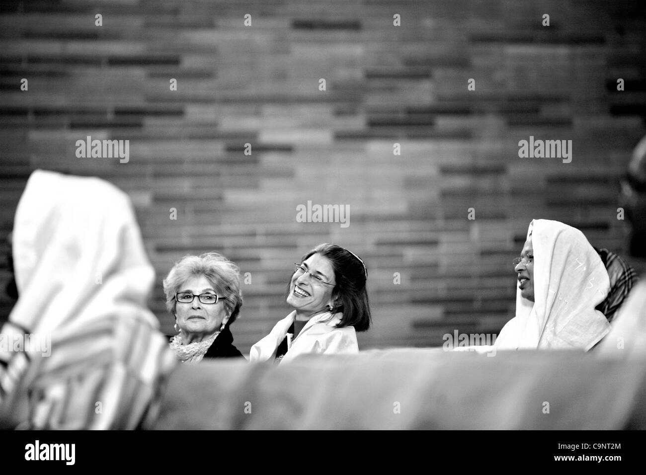 Feb 23, 2008 - Chicago, Illinois, USA -  Visiting Rabbi Janise Poticha, 54, center, and her mother, Revera Poticha, 80, left, attend Shabbat service at Beth Shalom B'nai Zaken Ethiopian Hebrew Congregation in Chicago's Marquette Park neighborhood. Janise Poticha is a Rabbi at Temple Sinai of Massape Stock Photo