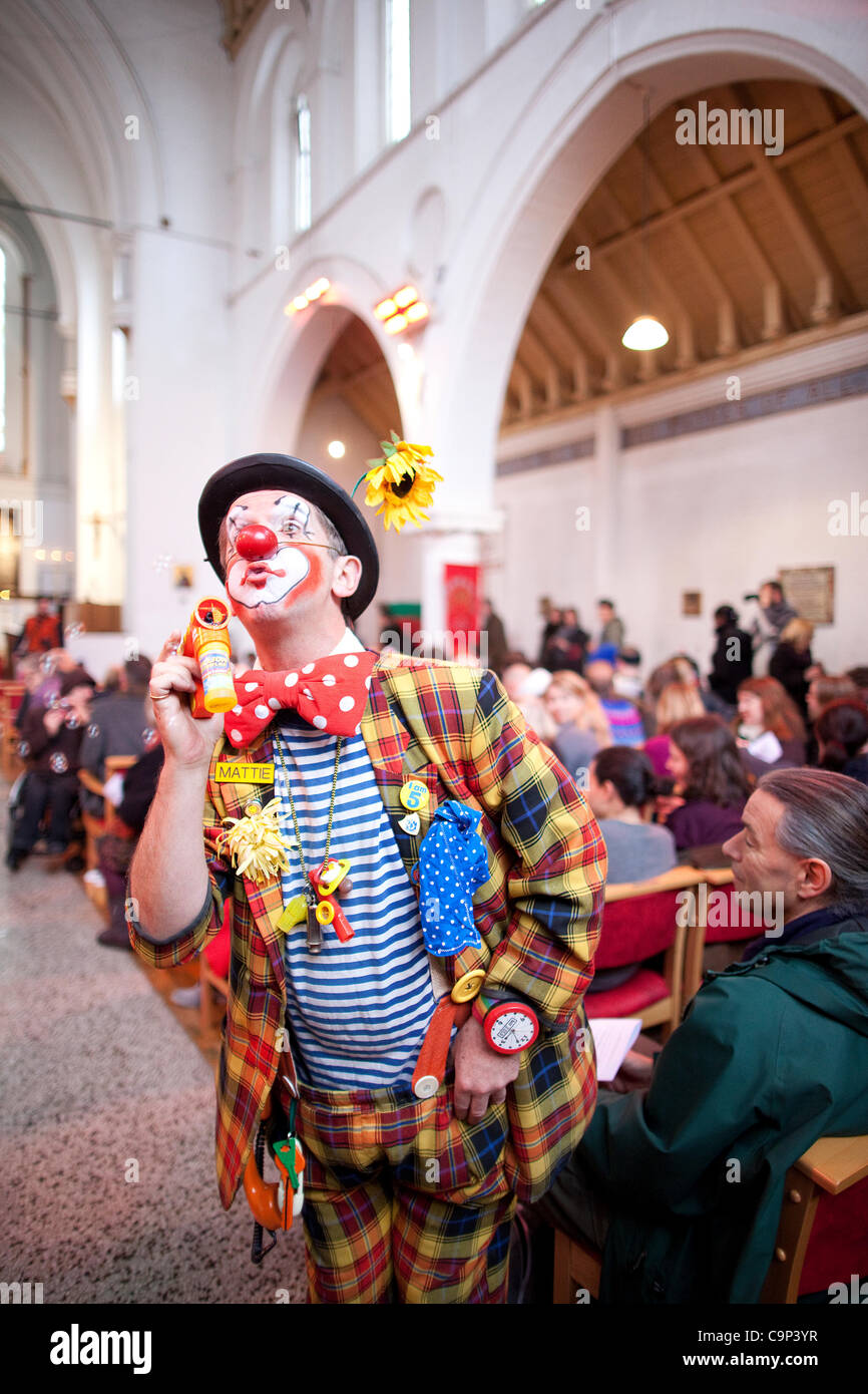 Clown Church Service, Holy Trinity Church, Dalston, East London, UK. 05.02.2012 Clowns gather at the Holy Trinity Church in Dalston, east London to attend a church service in memory of Joseph Grimaldi, the most celebrated English clown. Stock Photo