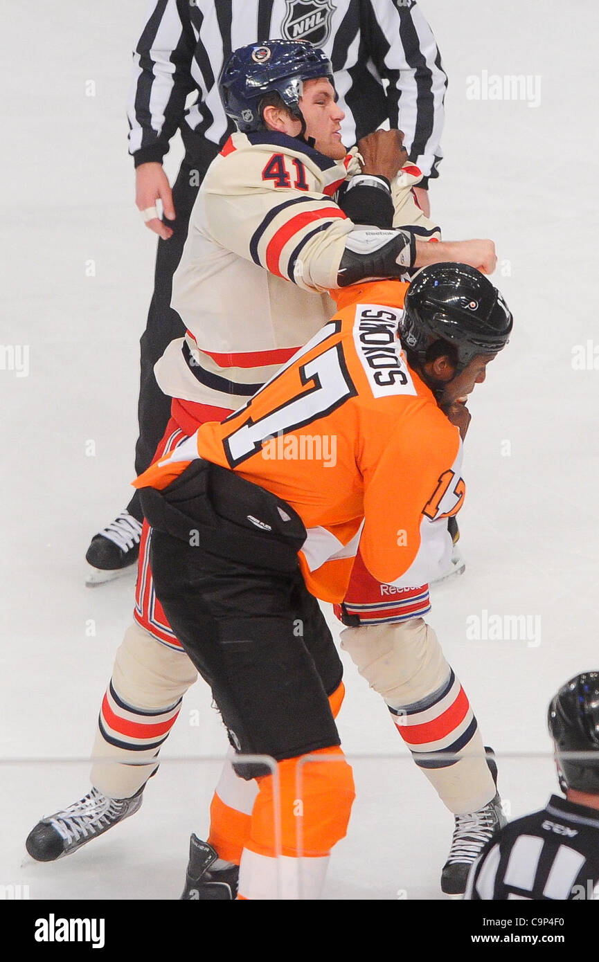 Feb. 05, 2012 - Newark, New Jersey, U.S. - Philadelphia Flyers right wing Wayne Simmonds (17) fights New York Rangers defenseman Stu Bickel (41) during first period NHL action between the Philadelphia Flyers and the New York Rangers at Madison Square Garden in New York, N.Y. The Rangers lead 1-0 at  Stock Photo