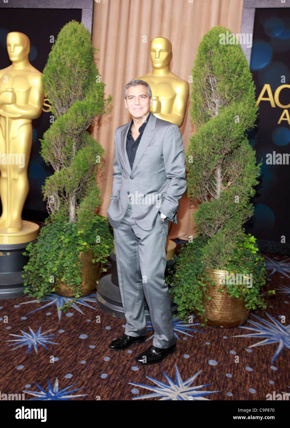 George Clooney at a public appearance for The 84th Academy Awards Nominees Luncheon, Beverly Hilton Hotel, Beverly Hills, CA February 6, 2012. Photo By: Jef Hernandez/Everett Collection Stock Photo