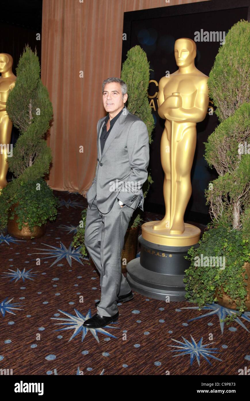 George Clooney at a public appearance for The 84th Academy Awards Nominees Luncheon, Beverly Hilton Hotel, Beverly Hills, CA February 6, 2012. Photo By: Jef Hernandez/Everett Collection Stock Photo