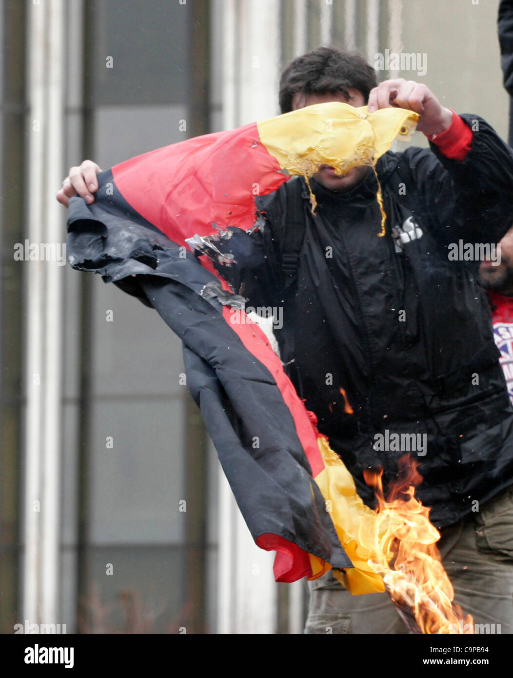 Protesters burn greek flag during hi-res stock photography and images ...