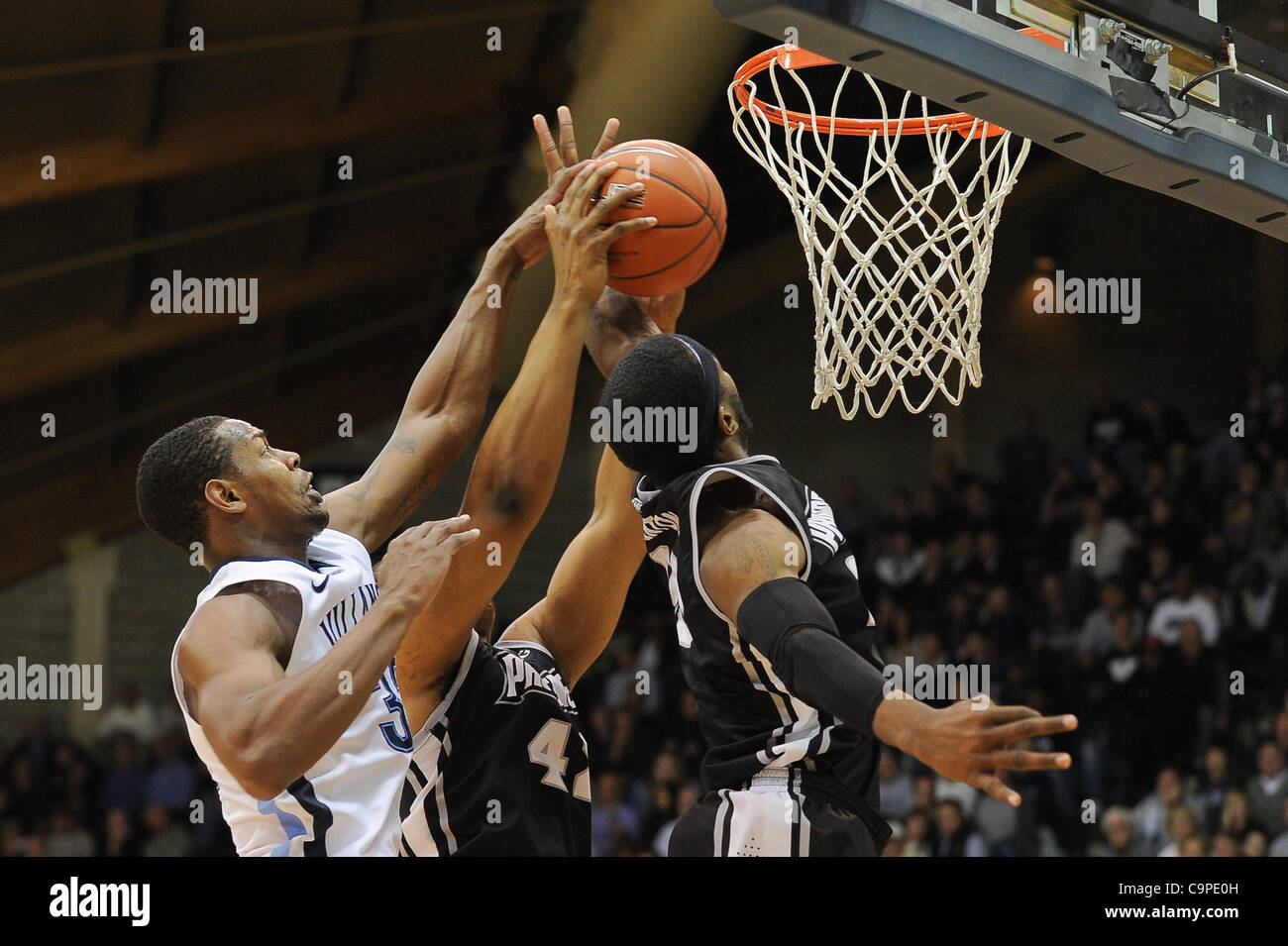 Feb. 7, 2012 - Villanova, Pennsylvania, U.S - Villanova Wildcats guard James Bell (32) blocks a shot by Providence Friars guard Chris Carter (41). In a game being played at The Pavilion in Villanova, Pennsylvania. Villanova defeats Providence by a score of 74-72. (Credit Image: © Mike McAtee/Southcr Stock Photo