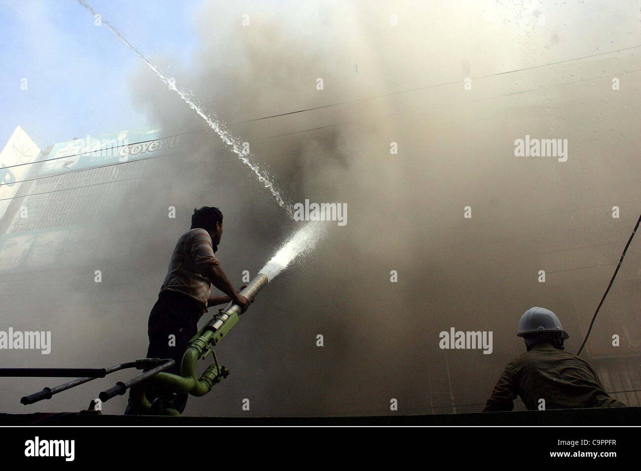 Firefighters extinguish fire that broke out at a building at Brandrath ...