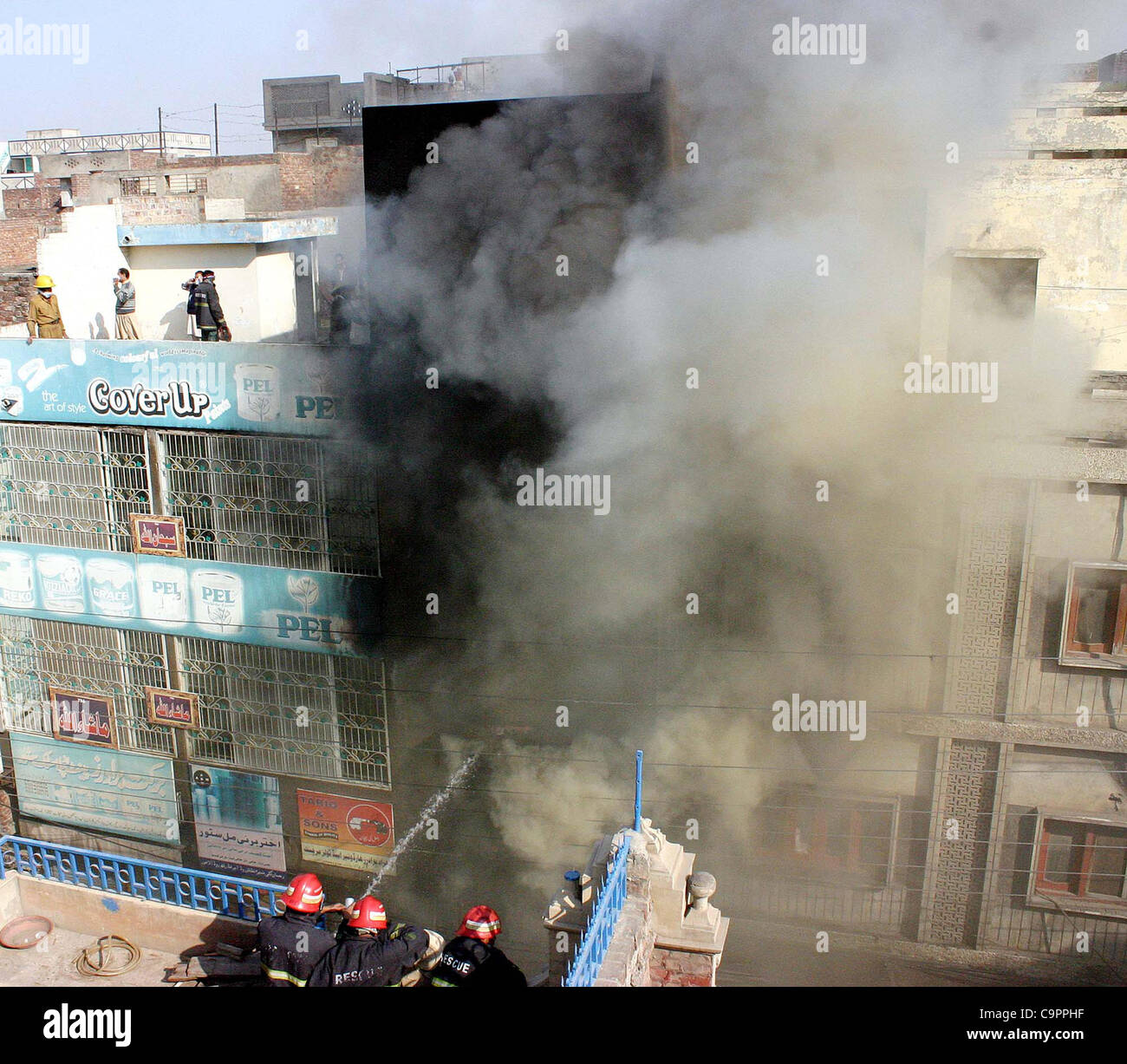 Firefighters extinguish fire that broke out at a building at Brandrath ...