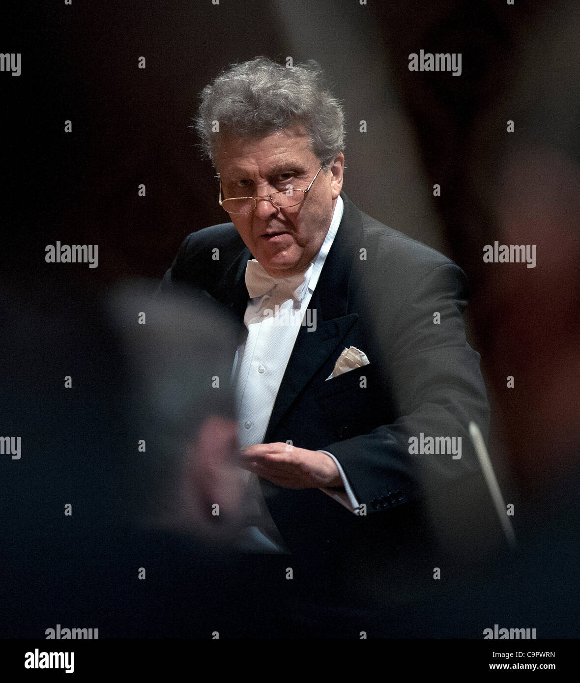 Russian conductor Vassily Sinaisky performs with the Czech Philharmonic Orchestra in Prague, Czech Republic, on Thursday, February 9, 2012. (CTK Photo/Michal Dolezal) Stock Photo